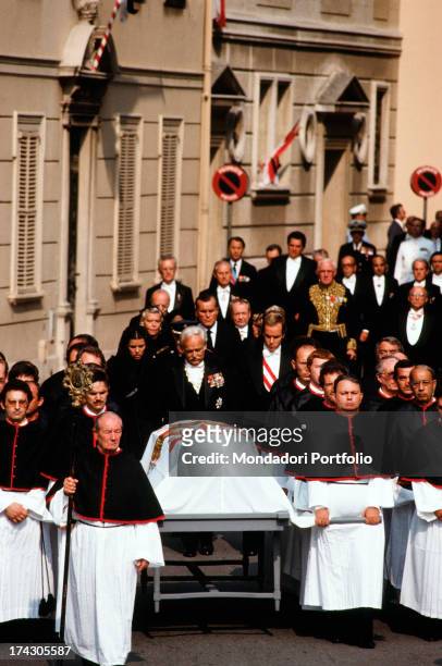 Ranieri III next to his sons Caroline and Albert in the funeral procession follow the coffin of Princess Grace, carried by 12 members of the...