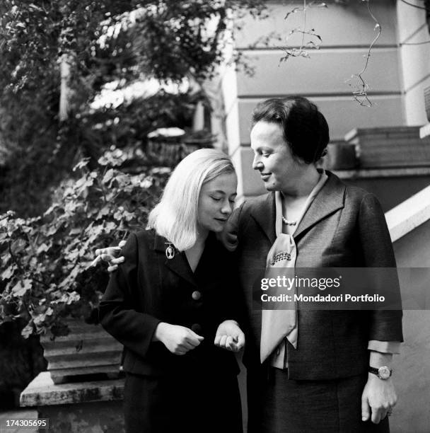 Italian deputy Nilde Iotti looking at her adopted daughter Marisa Malagoli Togliatti. Rome, 1964.