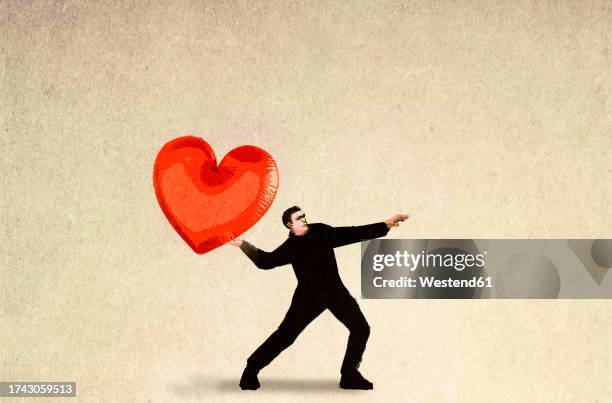 illustration of man throwing oversized heart - nicht-erwiderte-liebe stock-grafiken, -clipart, -cartoons und -symbole