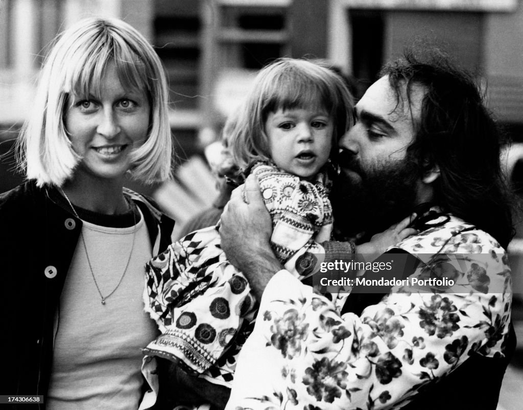 Greek singer and bass player Demis Roussos holding his daughter Emily... News Photo Getty Images