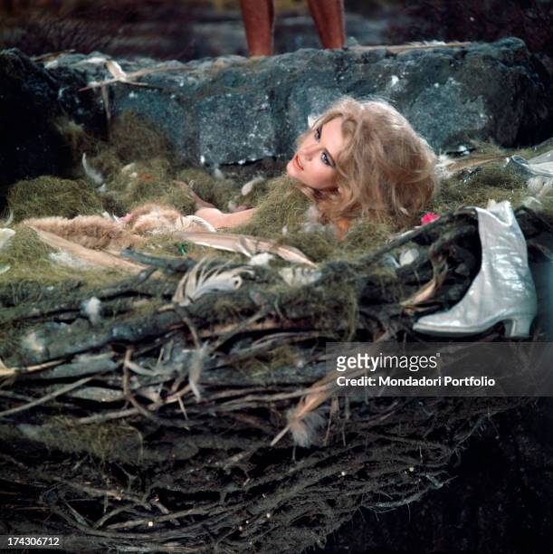 The American actress Jane Fonda, playing the charming astronaut Barbarella in the homonymous movie directed by her husband Roger Vadim, rests...