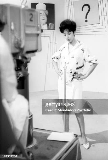 Marisa Del Frate, actress and singer, at the center of the stage shot by a television camera during the television program L'amico del Giaguaro , of...
