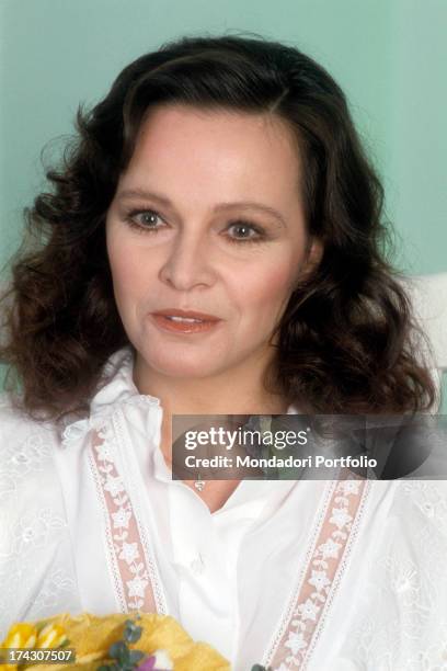 Close-up of the Italian actress Laura Antonelli, known for her role in the film Malice by Salvatore Samperi ; the actress is wearing a white blouse...