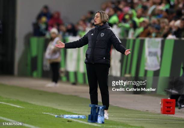 Paris FC Head Coach Sandrine Soubeyrand instructs her team during the UEFA Women's Champions League Qualifying Round 2 Second Leg match between VfL...