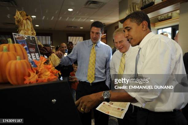 Democratic presidential candidate Illinois Senator Barack Obama and Ohio Governor Ted Strickland order food while paying a visit to Fireside Diner in...