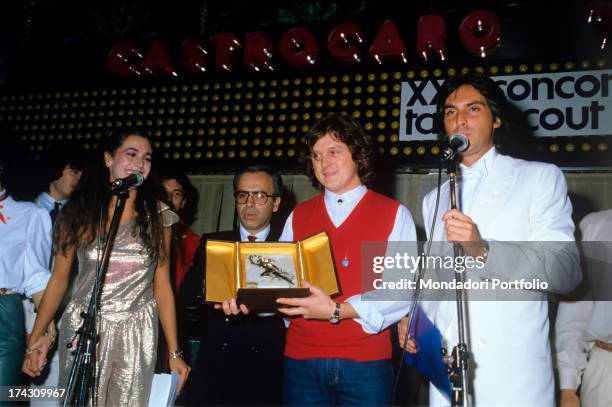 The Italian singer-songwriter Zucchero, born Adelmo Fornaciari, receives the first prize on the stage of Castrocaro Festival. Castrocaro Terme e...