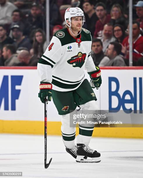 Jon Merrill of the Minnesota Wild skates during the third period against the Montreal Canadiens at the Bell Centre on October 17, 2023 in Montreal,...