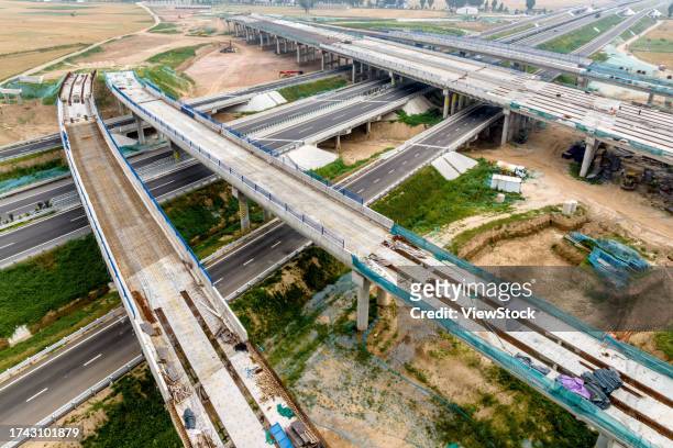 henan huaxian county enjoys ann, high-speed across puwei hub interchange nervous construction at a high speed - huaxian stock pictures, royalty-free photos & images
