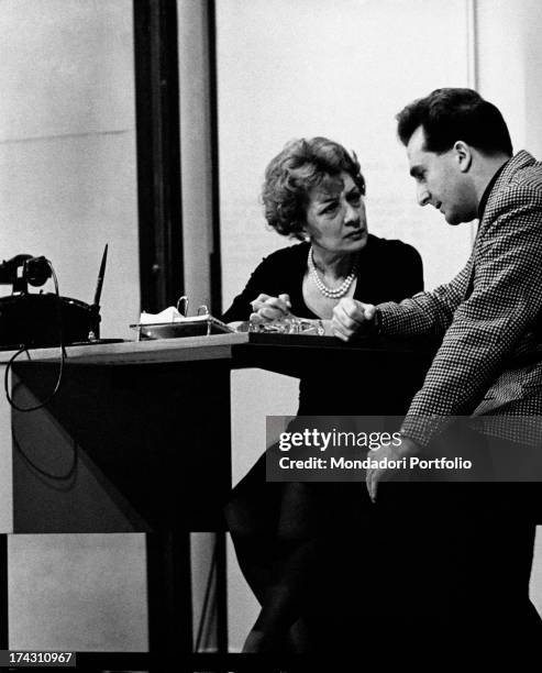 Italian actress Andreina Pagnani talking with Italian actress Giuliana Lojodice iin the theatrical drama Quaderno proibito. Rome, December 1961.