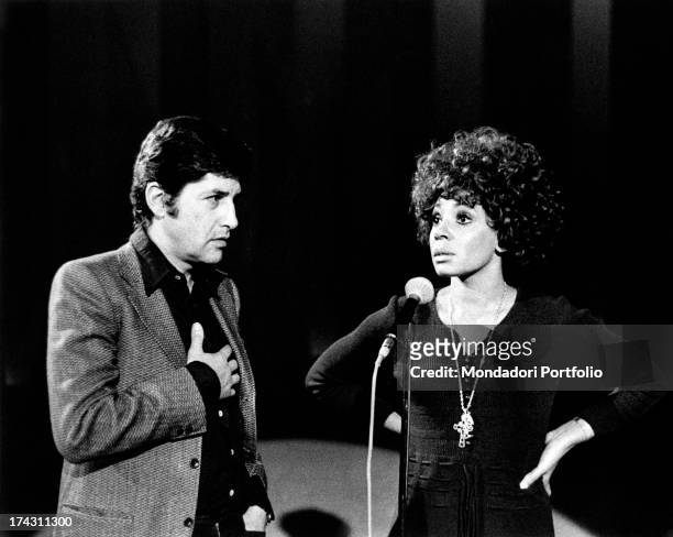Italian director Antonello Falqui talking to British singer Shirley Bassey during the rehearsals of the TV variety show Teatro 10. Rome, 1971.
