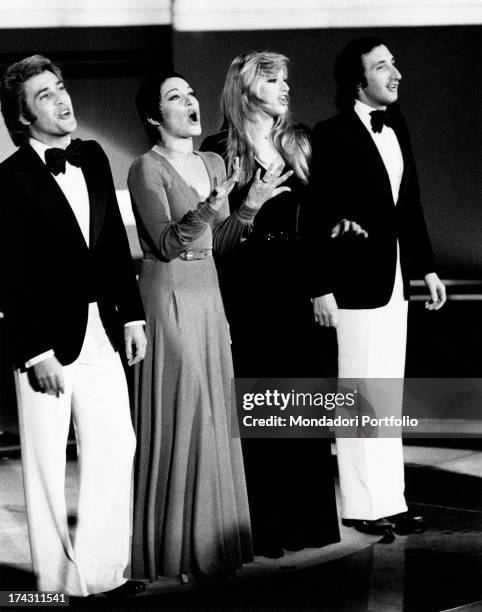 Italian singers Marina Occhiena, Angela Brambati, Angelo Sotgiu and Franco Gatti performing during the final night of the 18th Canzonissima. They...