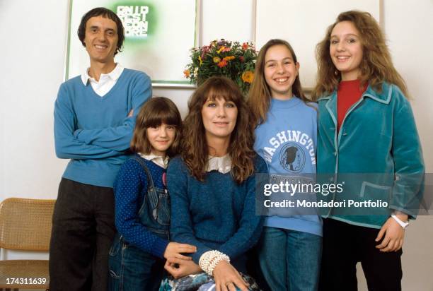 Italian director and scriptwriter Dario Argento and his wife, the Italian actress Daria Nicolodi smiling and posing with their daughters and Italian...