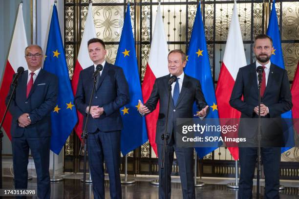 Opposition party leaders, from left, Wlodzimierz Czarzasty, Szymon Holownia, Donald Tusk and Wladyslaw Kosiniak-Kamysz announce to the media that...