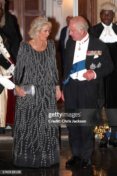 Queen Camilla and King Charles III arrive at a reception and dinner in honour of their Coronation on October 18, 2023 at Mansion House in London,...