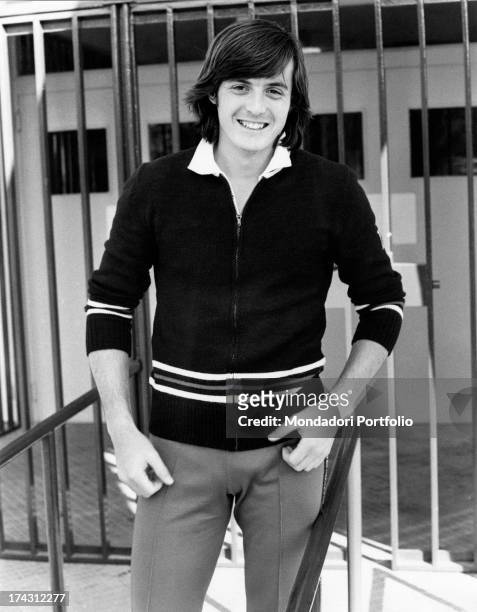 Portrait of Italian tennis player Adriano Panatta smiling. Rome, 1974.