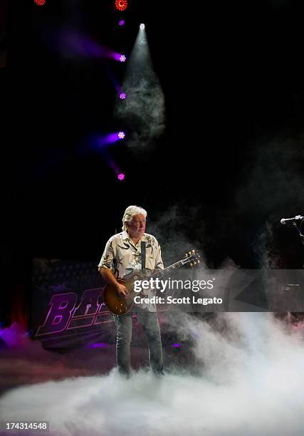 Mick Ralphs of Bad Company performs in concert at DTE Energy Center on July 23, 2013 in Clarkston, Michigan.