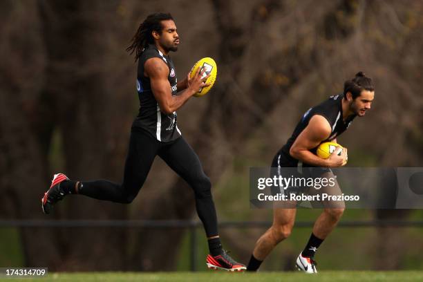 Harry O'Brien takes a mark during a Collingwood Magpies AFL training session at Olympic Park on July 24, 2013 in Melbourne, Australia.