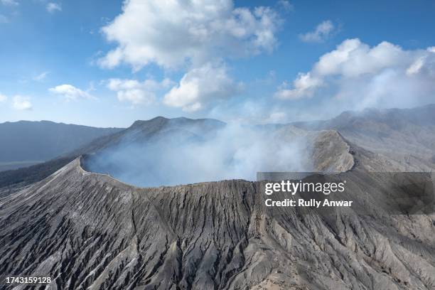 crater rim of mount bromo - volcanic crater stock-fotos und bilder