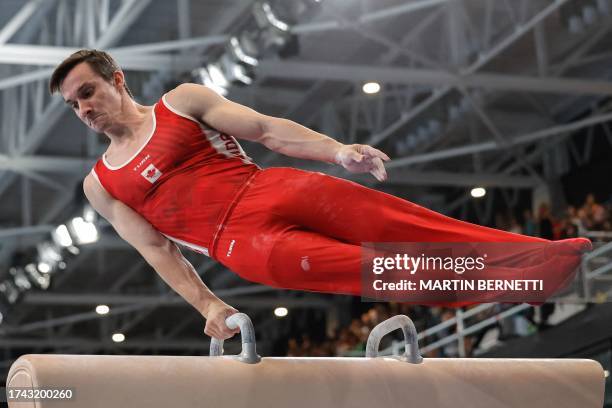 Canada's Clay Zachary performs his routine to win the gold medal in the artistic gymnastics men's pommel horse final during the Pan American Games...