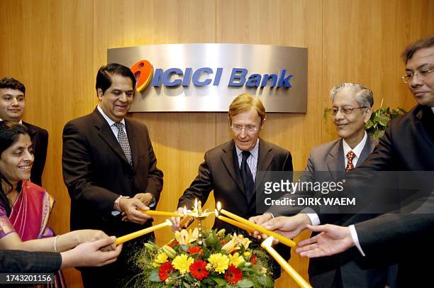 Managing director Kundapur Vaman Kamath of the ICICI bank of India , Antwerp Province Governor Camille Paulus and Indian Ambassador to Belgium Dipak...