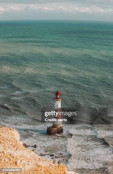 lighthouse at beachy head and white cliffs, eastbourne downland, south downs national park, england - south park stock pictures, royalty-free photos & images