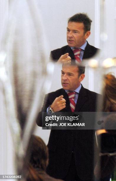 Reflecting on a mirror, Austrian far-right firebrand Joerg Haider speaks to foreign correspondents at his office in the southern province of...