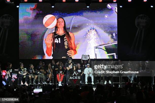 Kiah Stokes of the Las Vegas Aces speaks during the 2023 WNBA championship victory parade and rally on the Las Vegas Strip on October 23, 2023 in Las...