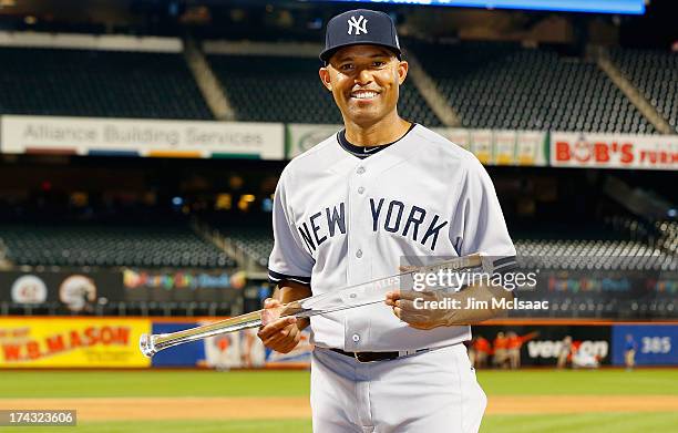 American League All-Star Mariano Rivera of the New York Yankees poses with the MVP trophy after the 84th MLB All-Star Game on July 16, 2013 at Citi...