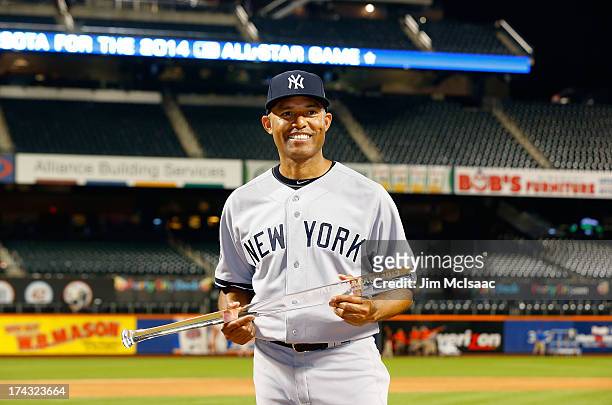 American League All-Star Mariano Rivera of the New York Yankees poses with the MVP trophy after the 84th MLB All-Star Game on July 16, 2013 at Citi...