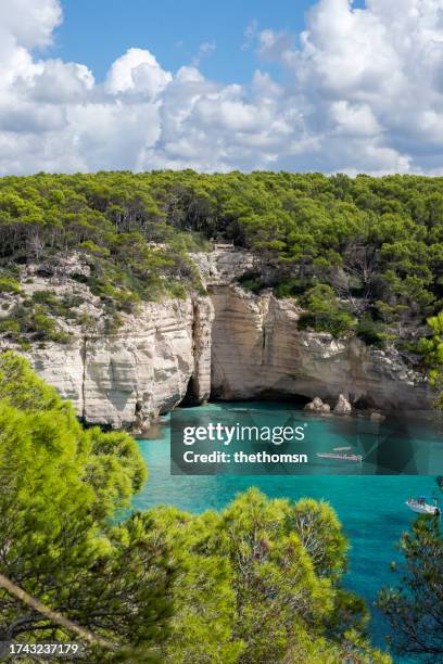 coastline of cala mitjana, menorca, spain - menorca stockfoto's en -beelden