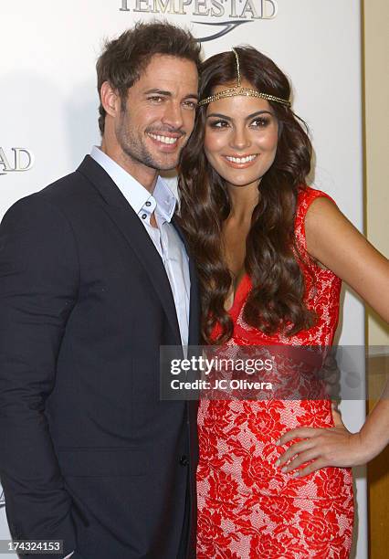 Actors William Levy and Ximena Navarrete attend the premiere of Univision's new Telenovela "La Tempestad" at Universal CityWalk on July 23, 2013 in...