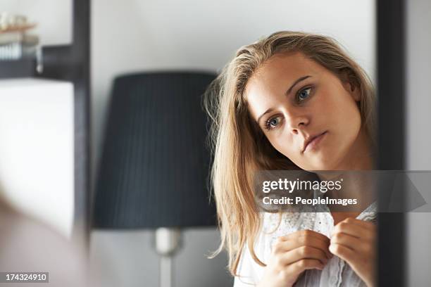 taking in her reflection - womens blouse stock pictures, royalty-free photos & images