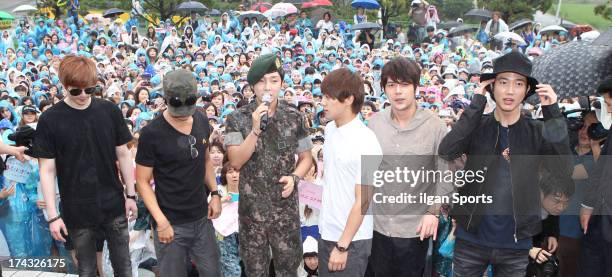 Yoon-Hak of Supernova is seen after being discharged from the military service on July 24, 2013 in Yongin, South Korea.