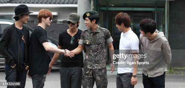 The members of Supernova congratulate Yoon-Hak on being discharged from the Military Service on July 24, 2013 in Yongin, South Korea.