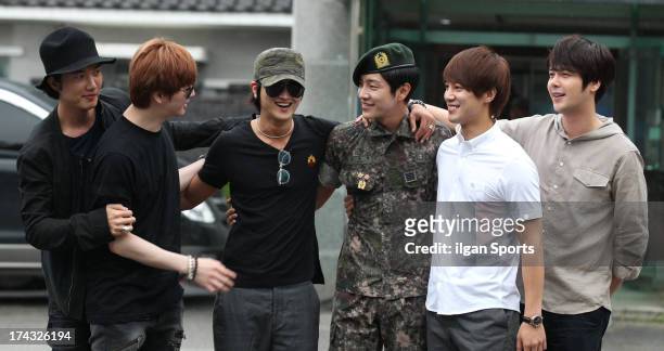 The members of Supernova congratulate Yoon-Hak on being discharged from the Military Service on July 24, 2013 in Yongin, South Korea.