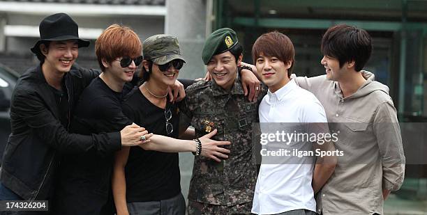 The members of Supernova congratulate Yoon-Hak on being discharged from the Military Service on July 24, 2013 in Yongin, South Korea.