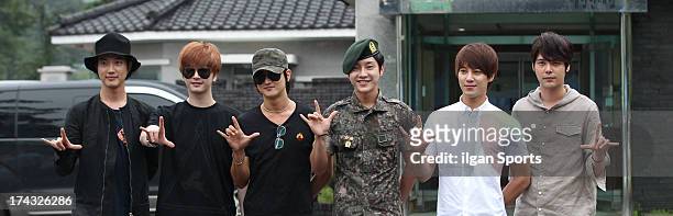 The members of Supernova congratulate Yoon-Hak on being discharged from the Military Service on July 24, 2013 in Yongin, South Korea.