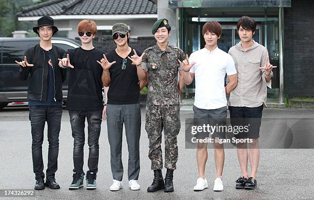 The members of Supernova congratulate Yoon-Hak on being discharged from the Military Service on July 24, 2013 in Yongin, South Korea.