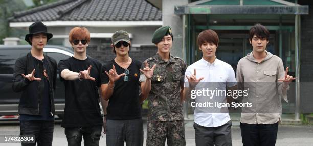 The members of Supernova congratulate Yoon-Hak on being discharged from the Military Service on July 24, 2013 in Yongin, South Korea.