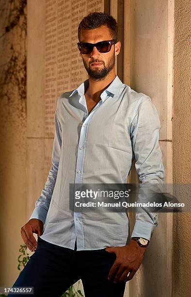 Professional tennis player Benoit Paire poses during a Maui Jim shooting at Lagardere Racing Club on July 23, 2013 in Paris, France.