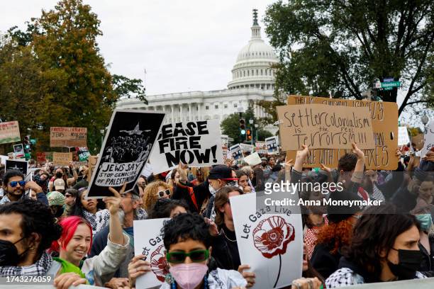 Demonstrators attend a rally in support of a cease fire in Gaza on Independence Avenue near the U.S. Capitol Building on October 18, 2023 in...