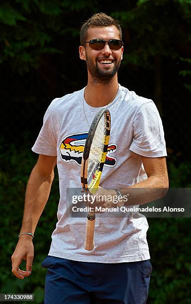 Professional tennis player Benoit Paire poses during a Maui Jim shoot at Lagardere Racing Club on July 23, 2013 in Paris, France.