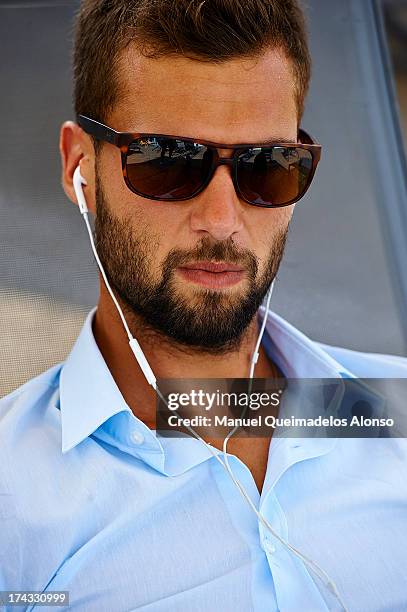 Professional tennis player Benoit Paire poses during a Maui Jim shoot at Lagardere Racing Club on July 23, 2013 in Paris, France.