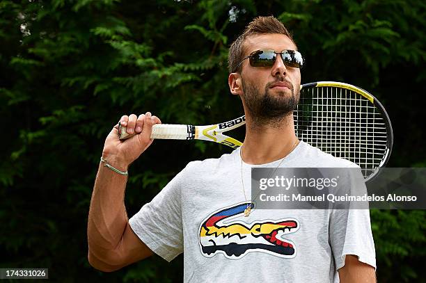 Professional tennis player Benoit Paire poses during a Maui Jim shoot at Lagardere Racing Club on July 23, 2013 in Paris, France.