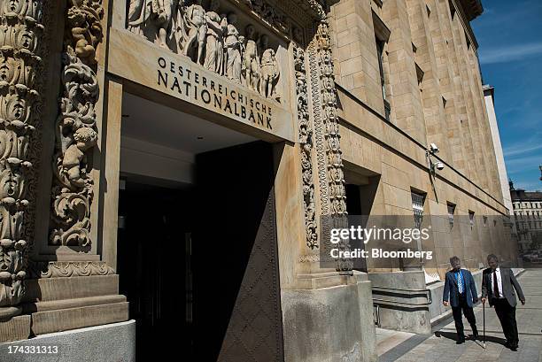 Pedestrians pass the headquarters of the Austrian central bank, also known as the Oesterreichische Nationalbank , in Vienna, Austria, on Tuesday,...