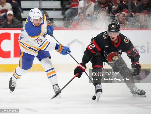 Thomas Chabot of the Ottawa Senators blocks a shot from Connor Clifton of the Buffalo Sabres at Canadian Tire Centre on October 24, 2023 in Ottawa,...