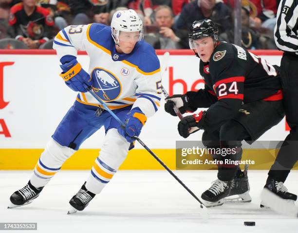 Jeff Skinner of the Buffalo Sabres stickhandles the puck against Jacob Bernard-Docker of the Ottawa Senators at Canadian Tire Centre on October 24,...