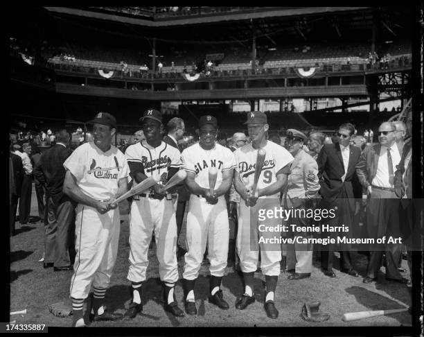 Baseball players Stan Musial of St. Louis Cardinals, Hank Aaron of Milwaukee Braves, Willie Mays of San Francisco Giants, and Wally Moon of Los...