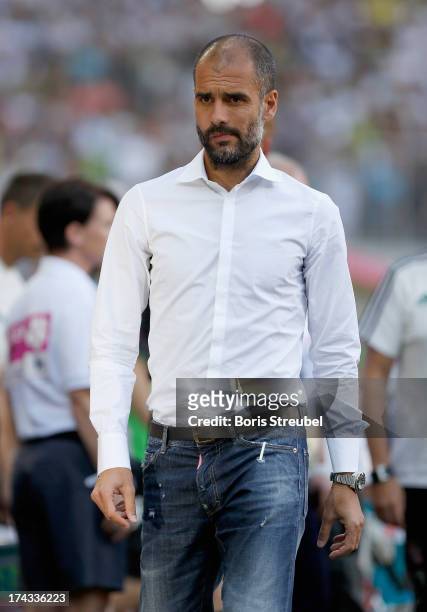 Head coach Josep Guardiola of FC Bayern Muenchen looks on prior to the Telekom 2013 Cup final between FC Bayern Muenchen and Borussia...