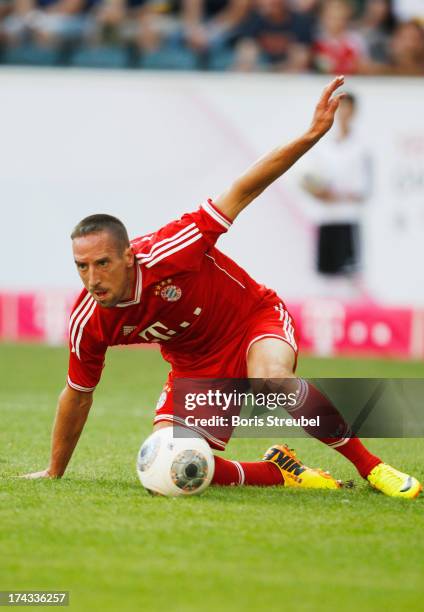 Franck Ribery of FC Bayern Muenchen runs with the ball during the Telekom 2013 Cup final between FC Bayern Muenchen and Borussia Moenchengladbach at...